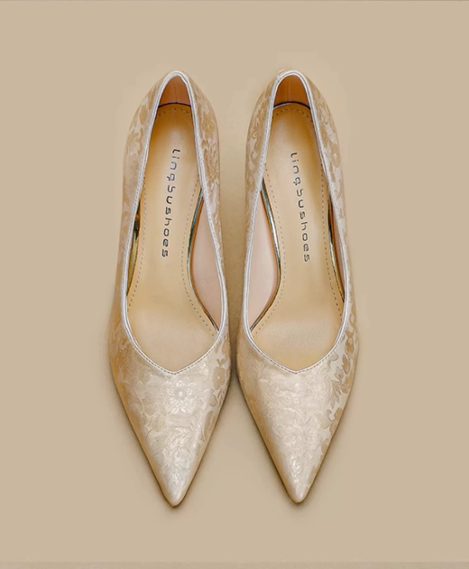 Embroidered champagne colored high heels Embroidered champagne colored high heels